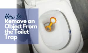 how to remove an object from toilet trap