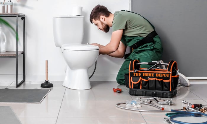 man-work-for-home-depot-toilet-installation